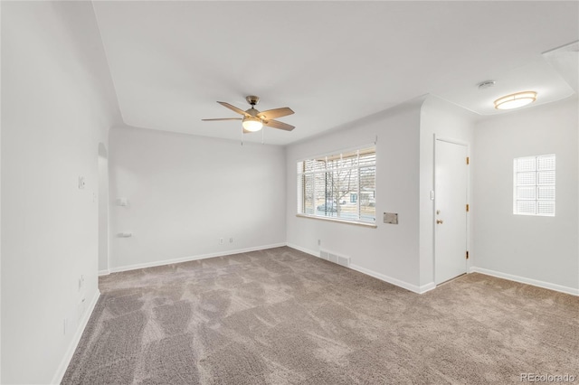 unfurnished room featuring carpet flooring and ceiling fan