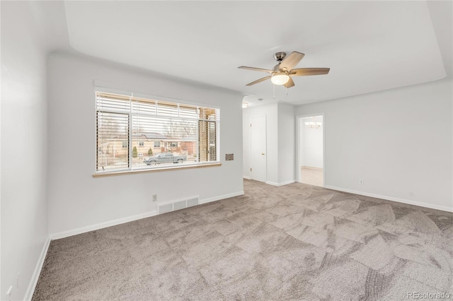 carpeted empty room with ceiling fan