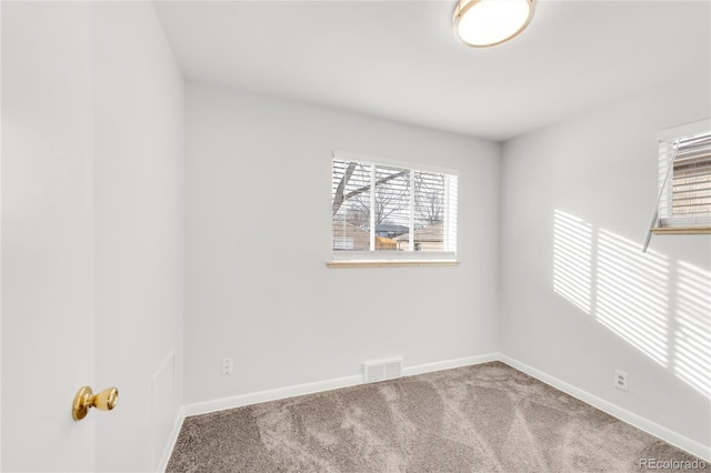 view of carpeted spare room