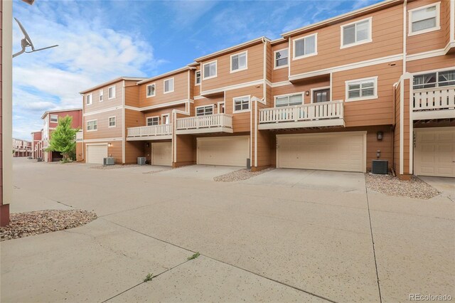 18061 E Saskatoon Pl, Parker, CO 80134 - view of building exterior with an attached garage and driveway