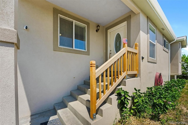 4750 County Road B, Wiggins, CO 80654 - property entrance featuring stucco siding