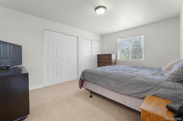 4750 County Road B, Wiggins, CO 80654 - bedroom featuring carpet floors and two closets