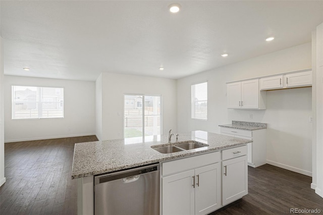 kitchen with white cabinetry, a kitchen island with sink, sink, and stainless steel dishwasher