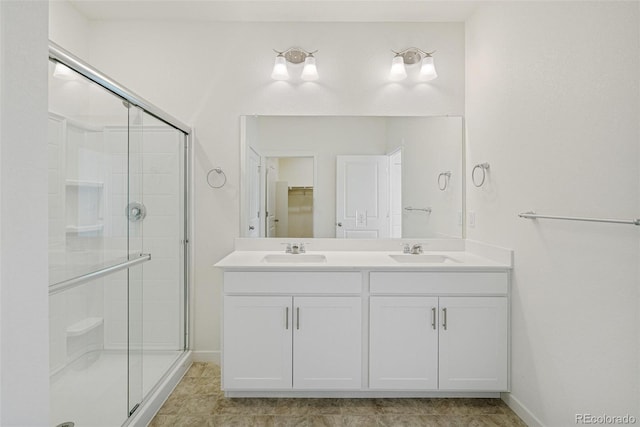 bathroom with vanity and walk in shower