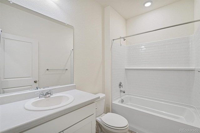 full bathroom with vanity,  shower combination, and toilet