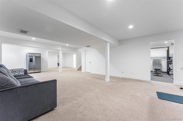 living room with light colored carpet