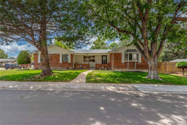 16699 E 7th Ave, Aurora, CO 80011 - ranch-style house featuring brick siding and crawl space