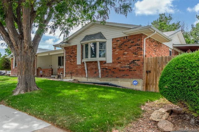 16699 E 7th Ave, Aurora, CO 80011 - view of side of property featuring brick siding