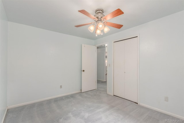 16699 E 7th Ave, Aurora, CO 80011 - unfurnished bedroom with light colored carpet, a closet, and ceiling fan