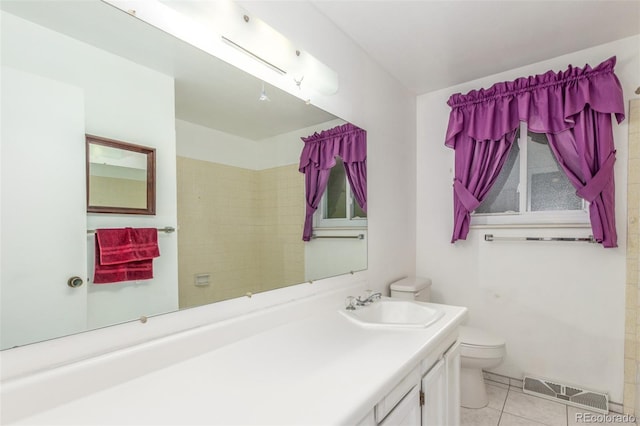 16699 E 7th Ave, Aurora, CO 80011 - bathroom featuring vanity and tile patterned flooring