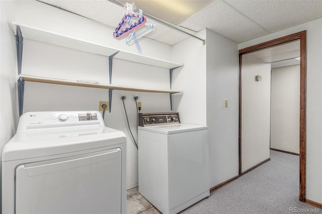 16699 E 7th Ave, Aurora, CO 80011 - washroom with washing machine and clothes dryer