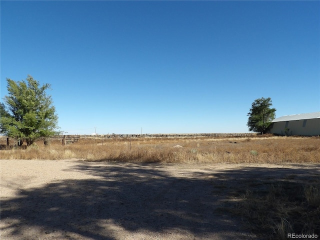 view of yard featuring a rural view