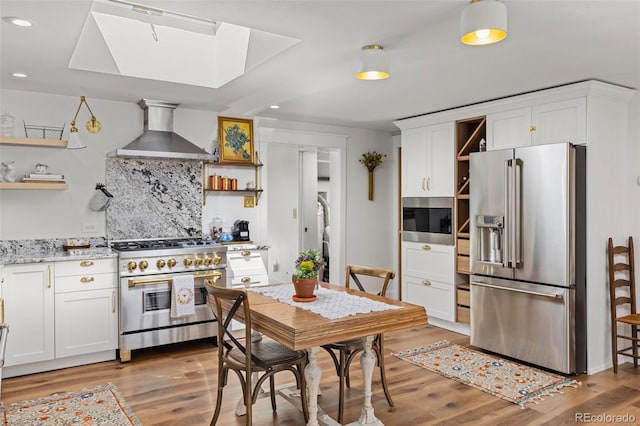 1669 Apple Valley Rd, Lyons, CO 80540 - kitchen with open shelves, high end appliances, wall chimney range hood, and recessed lighting