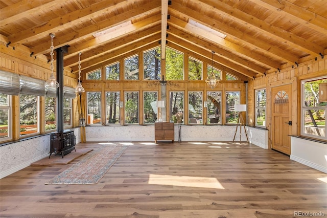 1669 Apple Valley Rd, Lyons, CO 80540 - unfurnished sunroom featuring a wood stove