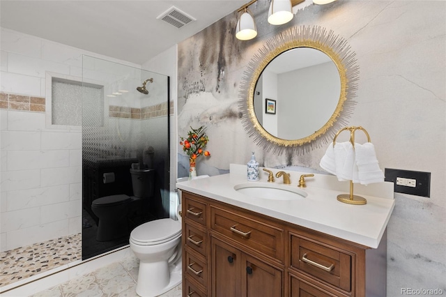 1669 Apple Valley Rd, Lyons, CO 80540 - bathroom with toilet, vanity, and tiled shower