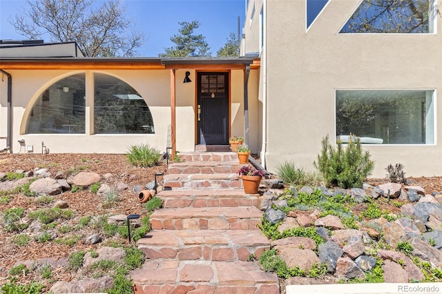 1669 Apple Valley Rd, Lyons, CO 80540 - doorway to property featuring stucco siding