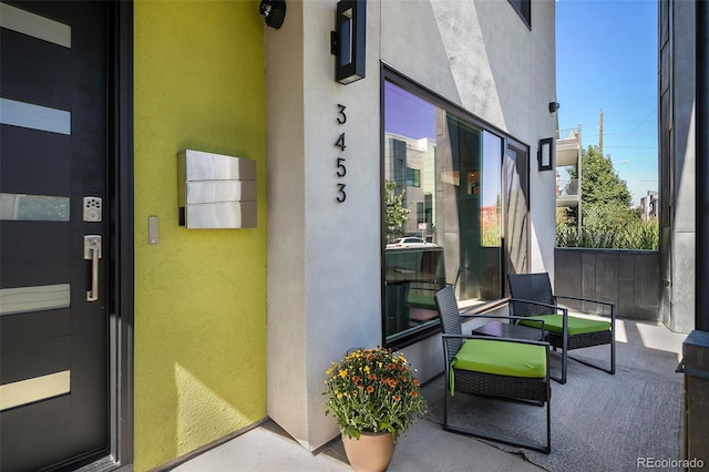 3453 Navajo St, Denver, CO 80211 - doorway to property with stucco siding