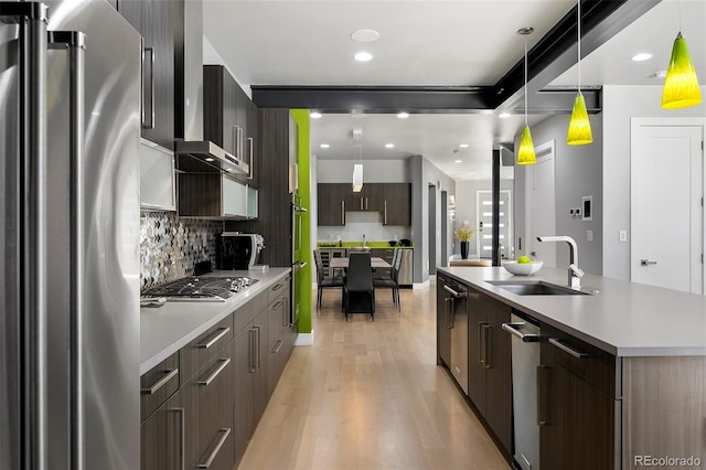 3453 Navajo St, Denver, CO 80211 - kitchen featuring stainless steel appliances, a sink, modern cabinets, and recessed lighting