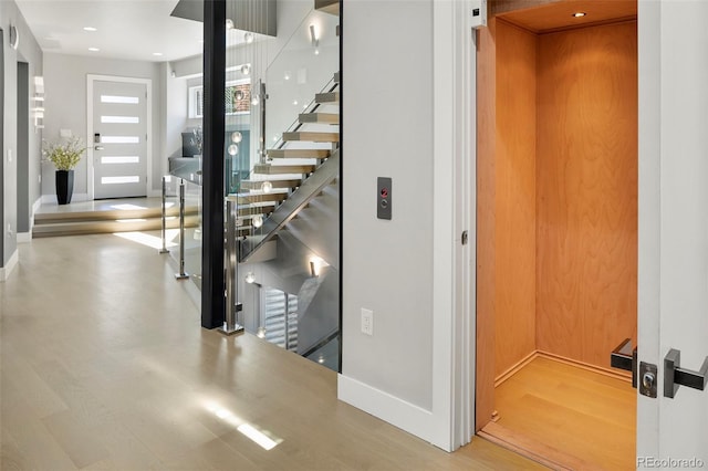 3453 Navajo St, Denver, CO 80211 - wine cellar with elevator, baseboards, and wood finished floors