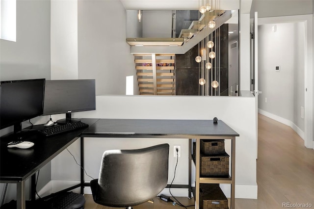 3453 Navajo St, Denver, CO 80211 - home office featuring baseboards and wood finished floors