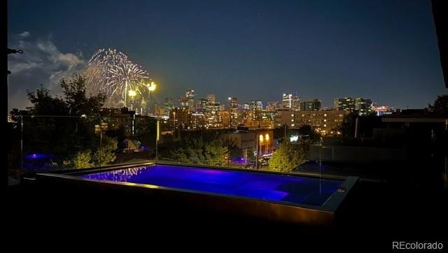 3453 Navajo St, Denver, CO 80211 - pool at twilight featuring a view of city lights
