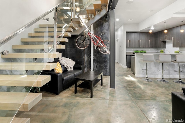 3453 Navajo St, Denver, CO 80211 - stairway featuring finished concrete floors and baseboards
