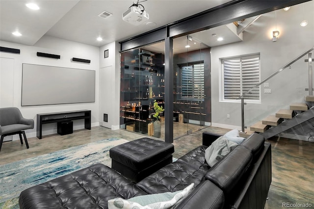 3453 Navajo St, Denver, CO 80211 - living area featuring baseboards, concrete flooring, stairs, and recessed lighting
