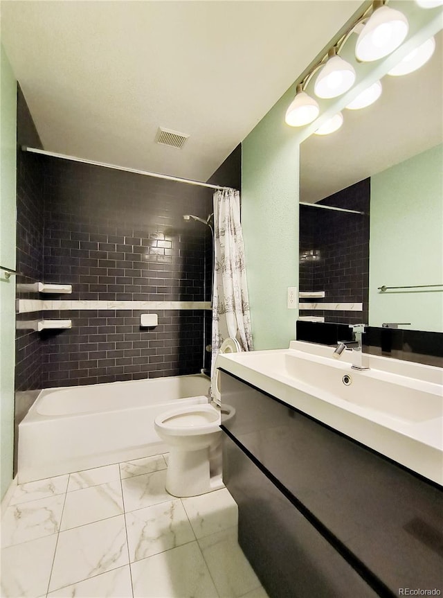 10154 Fairgate Way, Highlands Ranch, CO 80126 - full bath featuring vanity, shower / bath combo, marble finish flooring, and toilet