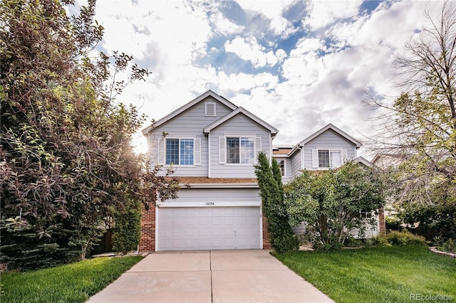 10154 Fairgate Way, Highlands Ranch, CO 80126 - view of front facade featuring brick siding, a garage, concrete driveway, and a front yard