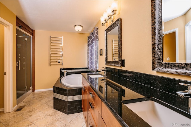 10154 Fairgate Way, Highlands Ranch, CO 80126 - full bathroom with a garden tub, double vanity, radiator, and tile patterned flooring