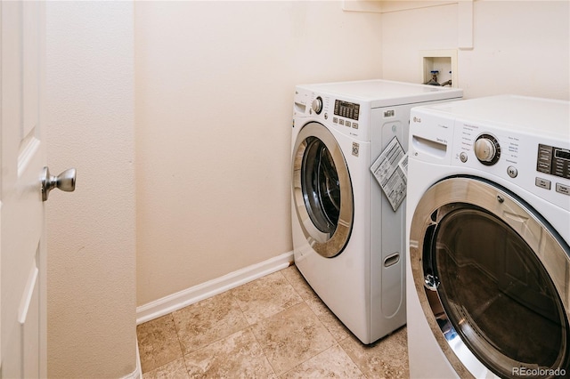 10154 Fairgate Way, Highlands Ranch, CO 80126 - laundry room with independent washer and dryer and baseboards