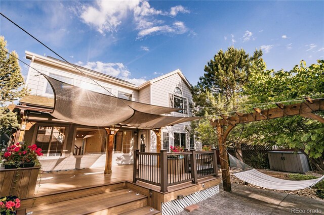10154 Fairgate Way, Highlands Ranch, CO 80126 - wooden terrace with a storage unit