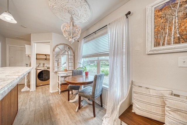 310 Chipeta Ave, Poncha Springs, CO 81242 - dining space with a chandelier and light wood-type flooring