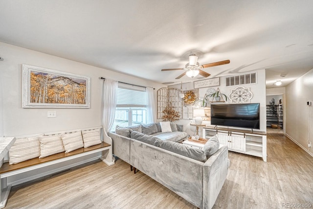 310 Chipeta Ave, Poncha Springs, CO 81242 - living area featuring light wood-style floors, ceiling fan, and baseboards