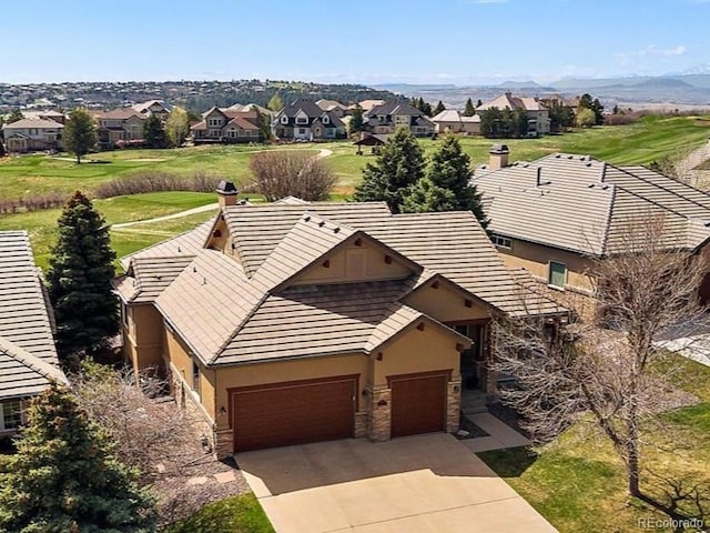 aerial view featuring a residential view and a mountain view