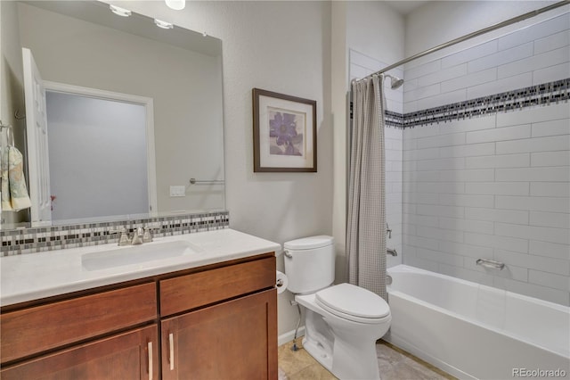 bathroom featuring toilet, decorative backsplash, shower / bath combination with curtain, and vanity