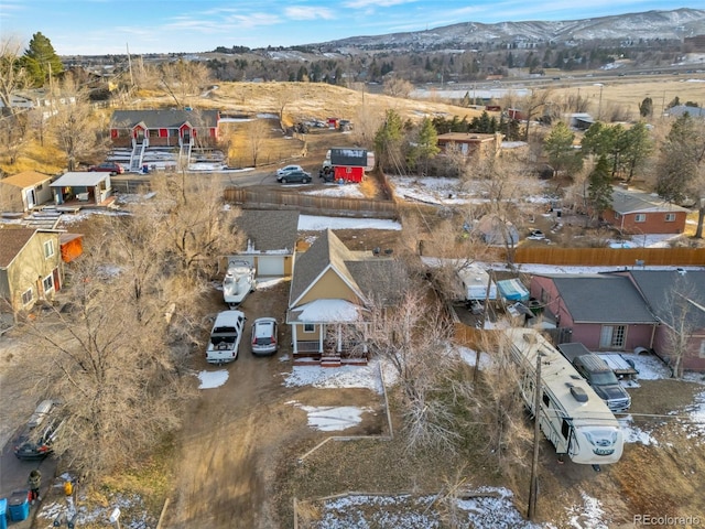 birds eye view of property with a mountain view