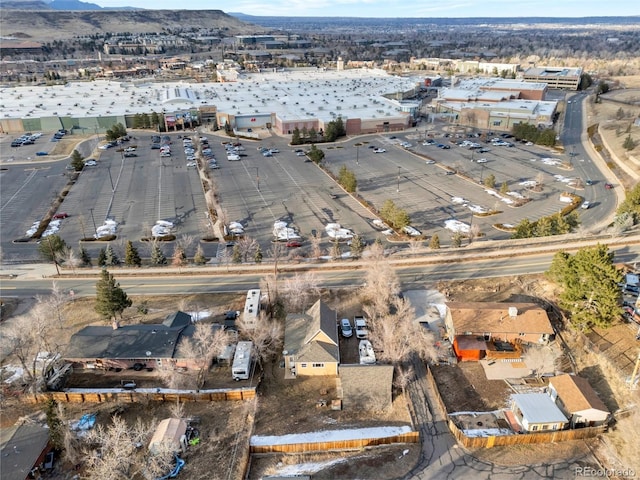 birds eye view of property with a mountain view