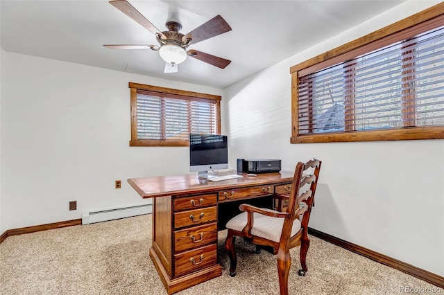 office area featuring a baseboard radiator, light carpet, and ceiling fan