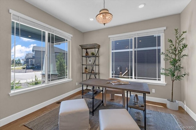 1721 Wingfeather Ln, Castle Rock, CO 80108 - office with healthy amount of natural light, wood finished floors, and recessed lighting