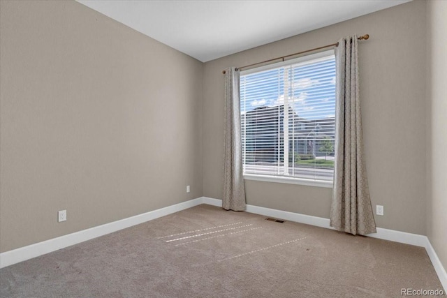 1721 Wingfeather Ln, Castle Rock, CO 80108 - carpeted empty room featuring baseboards