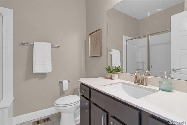 1721 Wingfeather Ln, Castle Rock, CO 80108 - full bathroom featuring vanity, an enclosed shower, and tile patterned floors