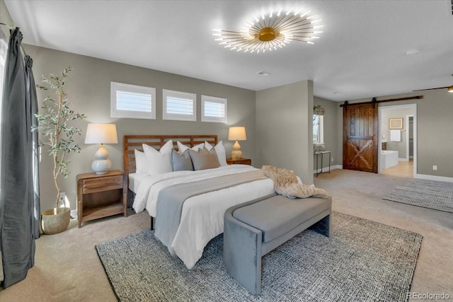 1721 Wingfeather Ln, Castle Rock, CO 80108 - bedroom featuring a barn door and light carpet