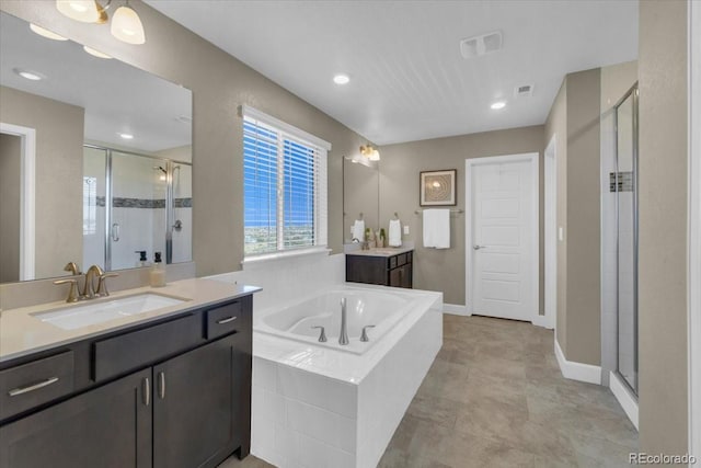 1721 Wingfeather Ln, Castle Rock, CO 80108 - bathroom with a shower stall, two vanities, and a bath