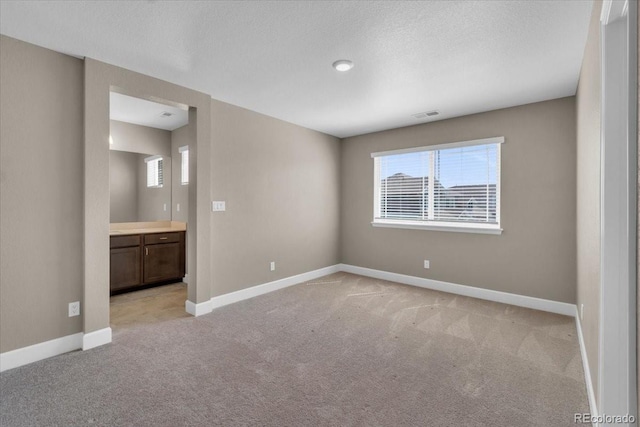 1721 Wingfeather Ln, Castle Rock, CO 80108 - unfurnished room featuring light colored carpet and baseboards