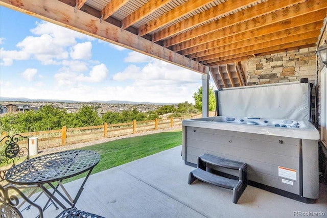 1721 Wingfeather Ln, Castle Rock, CO 80108 - view of patio featuring a hot tub and a mountain view