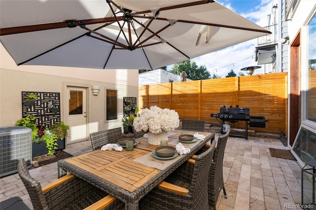 view of patio / terrace featuring central air condition unit