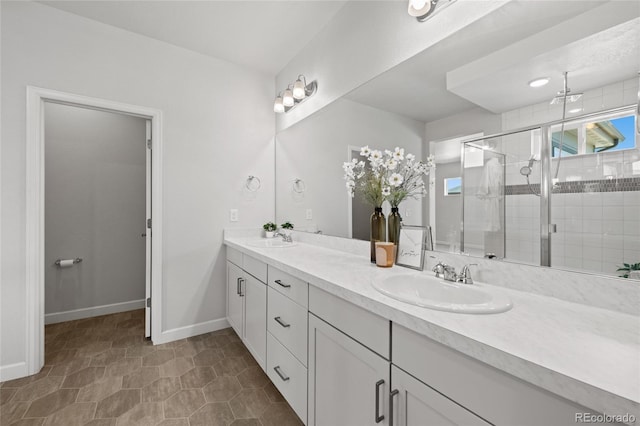 17970 E 106th Pl, Commerce City, CO 80022 - bathroom featuring double vanity and a shower stall