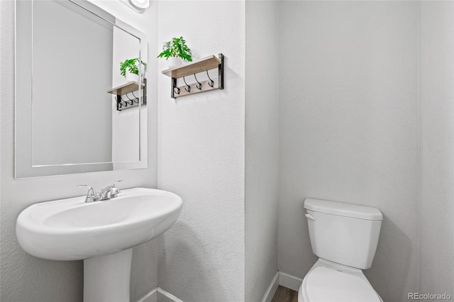 17970 E 106th Pl, Commerce City, CO 80022 - half bath with toilet and a sink