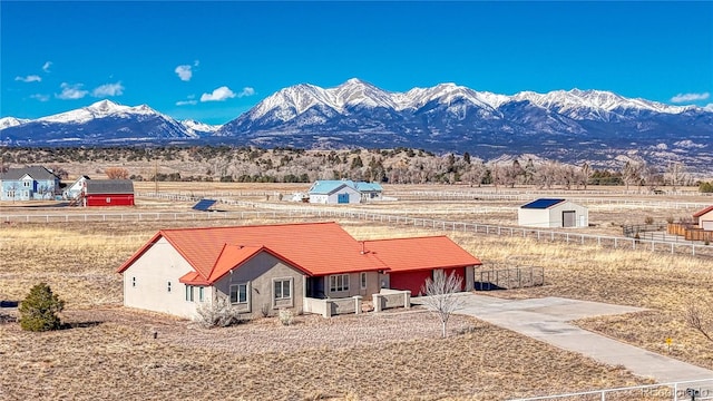 mountain view featuring a rural view